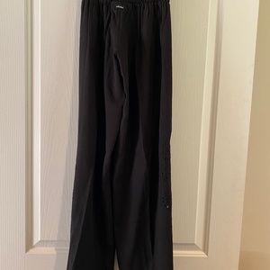 Black pants with pretty cutout detail on pant leg